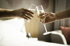 Close-up of a champagne toast at Crowne Plaza Hobart.