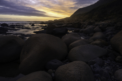 Boulder-Strewn Beach at Dusk – Tasmanian Coastline