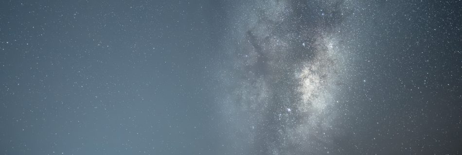 Milky way rise above a sea of clouds over the city of Hobart